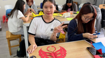 一纸一染承古韵，中外共话团圆情——国际学生非遗文化体验日活动成功举办